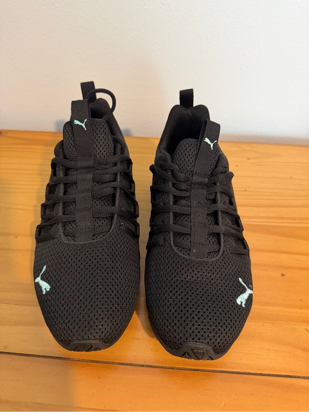 Puma Women’s Black Athletic Sneakers with Mint Logo